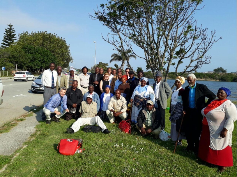 Members of the Prudhoe Community together with their legal team outside the Land Claims Court sitting in Port Alfred