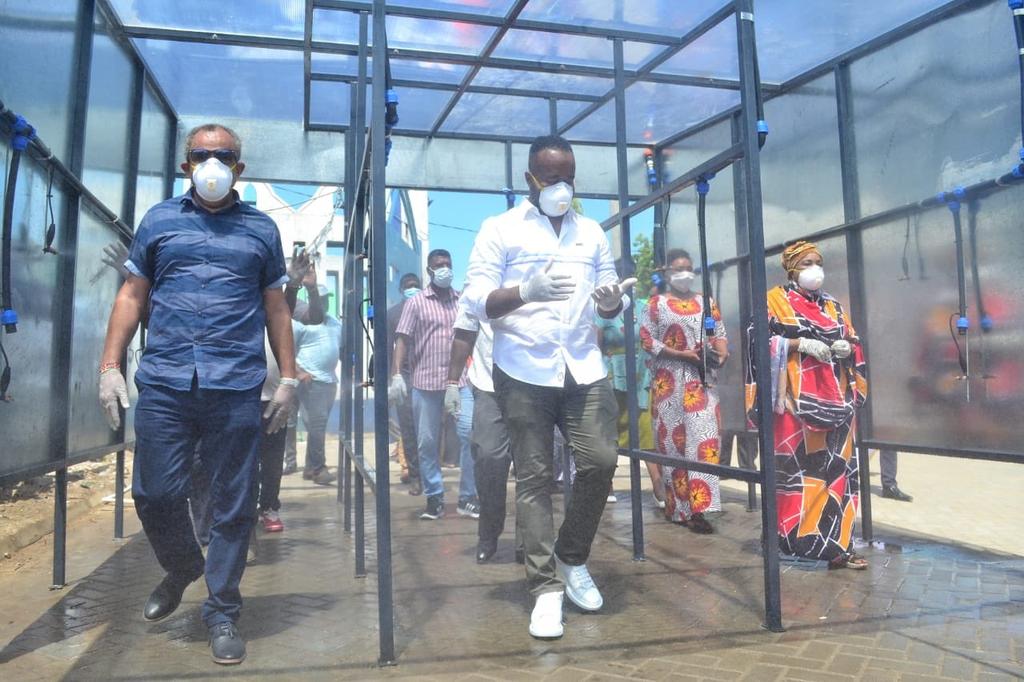 Ferry users in Mombasa being disinfected before being allowed to board the Likoni Ferry.
Courtesy: Mombasa County