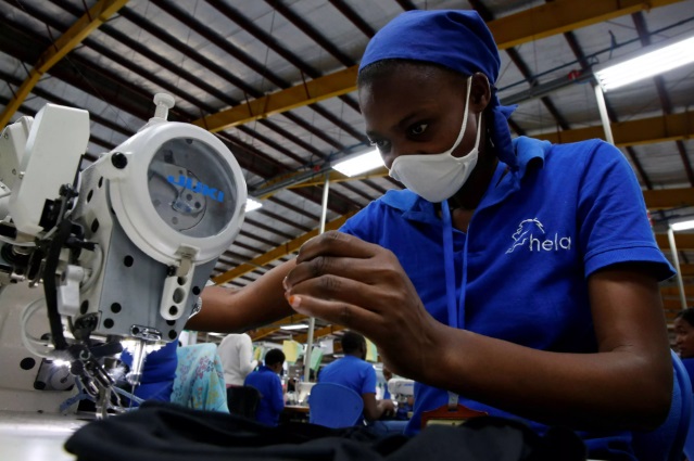 A worker sews at an export processing zone factory in Athi River, Kenya. Thomas Mukoya/Reuters